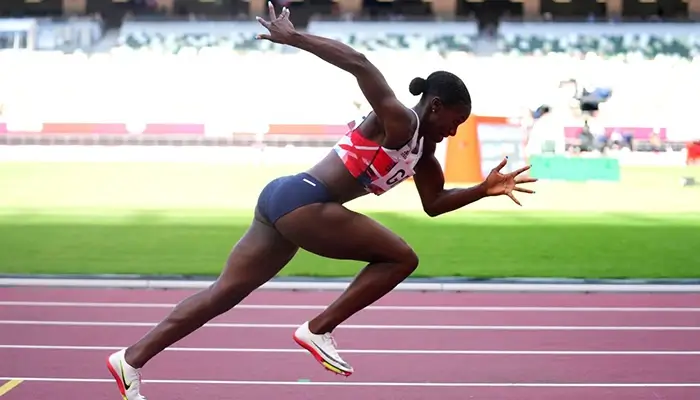 Black woman running in Olympics