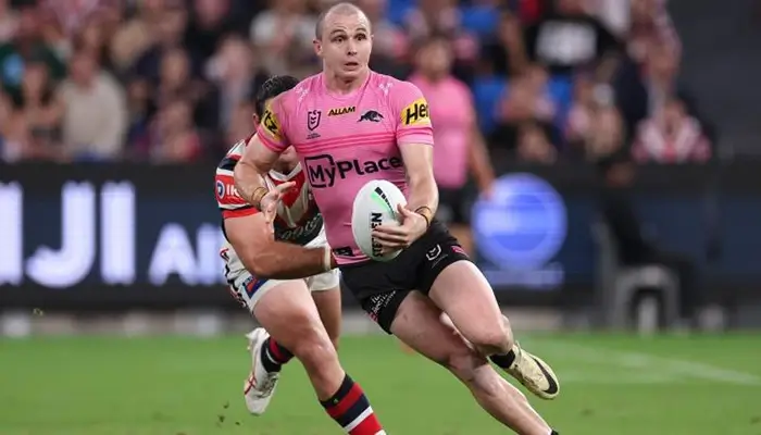 NRL player holding ball